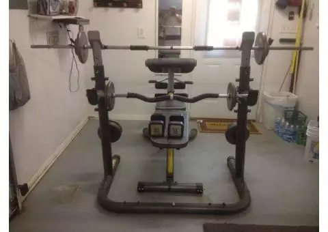 Weight bench with 150 pounds of plates